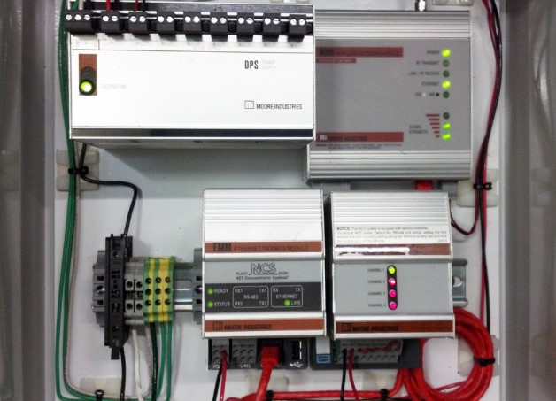 Figure 4: The wireless receiving panel installed at the boiler room of the pulp and paper mill. An EMM Ethernet/MODBUS Interface Module of the NCS NET Concentrator System served as a MODBUS Master to retrieve HART data from the HCS at the pond site.