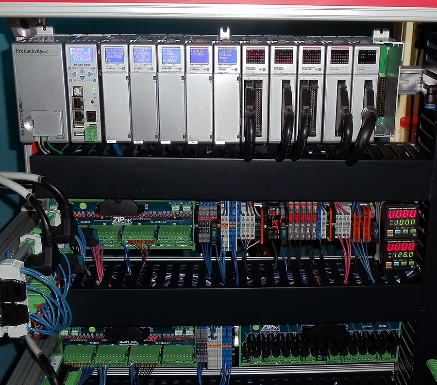Figure 2: A peek at Hubert’s control panel “brain” reveals an AutomationDirect Productivity3000 PLC, with extensive I/O and ZIPLink wiring.