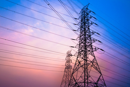 Optimal Control in Microgrid Using Multi-Agent Reinforcement Learning