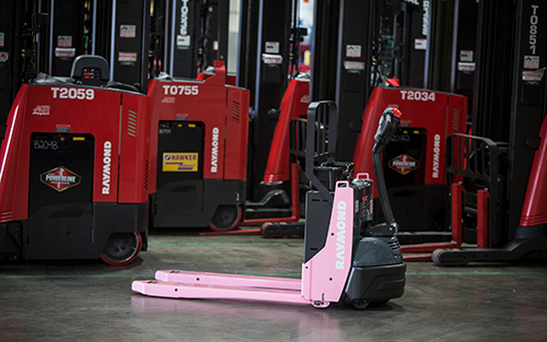 Raymond West Hosts 10th Annual Pink Pallet Jack Project to Benefit Breast Cancer Awareness