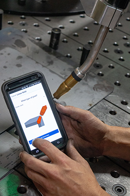 Customers teach BotX required welds via the Hirebotics app on any smartphone or tablet utilizing welding libraries specifically developed for BotX.    A connection enables 24/7 support by Hirebotics.